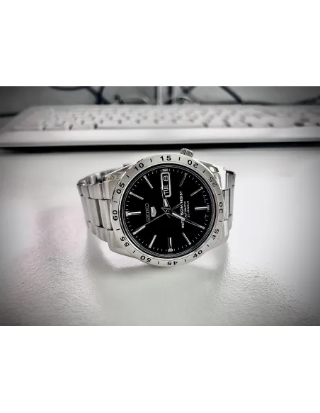 reloj automático hombre Seiko 5 SNKE01K1 dial negro 37mm correa acero 50m water resist
