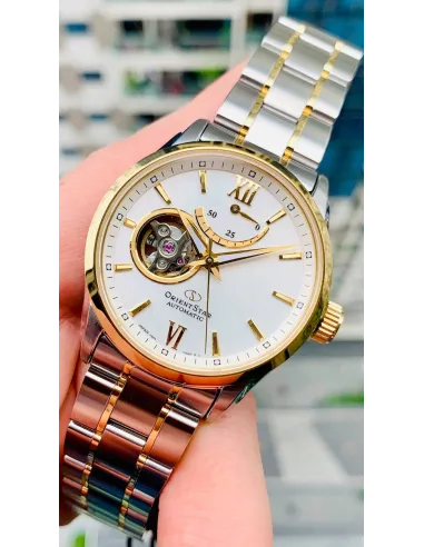 reloj automático hombre Orient Star RE-AT0004S dial blanco 39.3mm bisel dorado correa acero 2 tonos