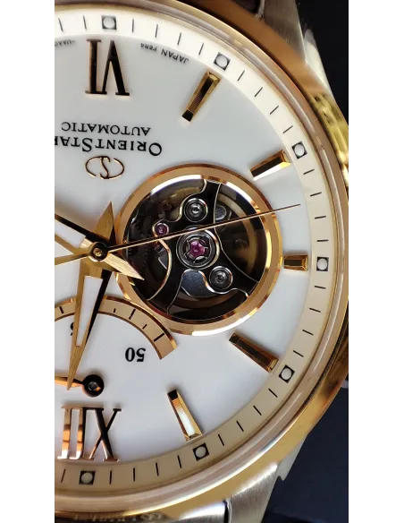 reloj automático hombre Orient Star RE-AT0004S dial blanco 39.3mm bisel dorado correa acero 2 tonos