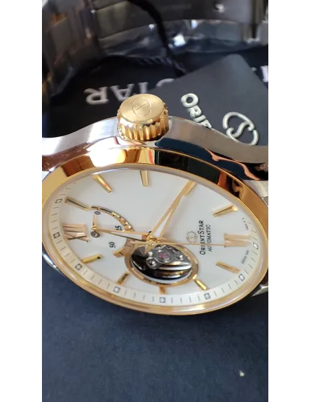 reloj automático hombre Orient Star RE-AT0004S dial blanco 39.3mm bisel dorado correa acero 2 tonos